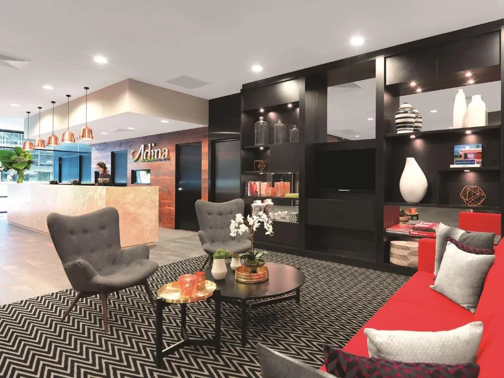 Reception and lounge at Adina Apartment Hotel Sydney Airport